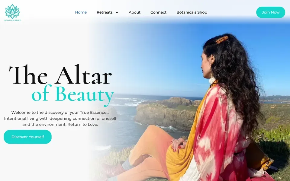 The Altar of Beauty homepage: the name in large serif type and a Discover Yourself button beside a photo of a woman sitting above the sea